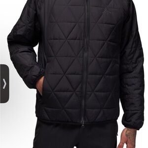 Jordan Black Puffer Jacket with Quilted Design. Like new, no tags butnever worn